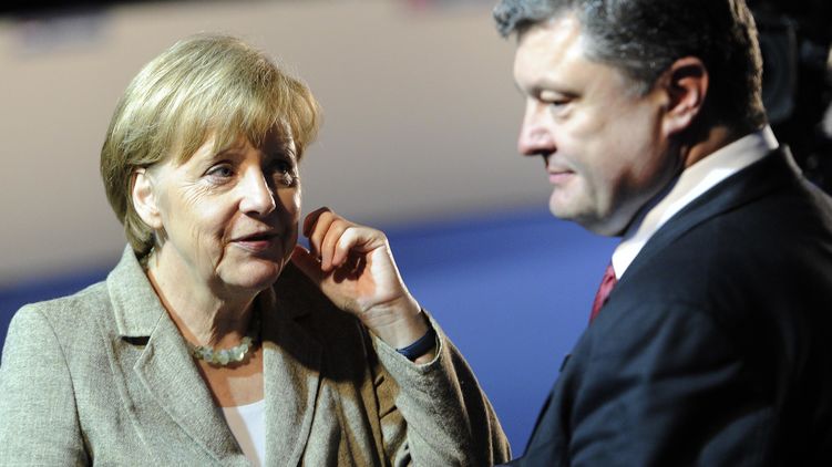 Визит канцлера Германии Ангелы Меркель станет первым в череде знаковых встреч президента Украины Петра Порошенко в ноябре, фото: 