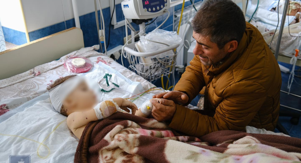 раненный мальчик в Абхазии